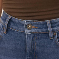 Woman wearing Marame Slim Leg Jeans in Deep Navy Wash Denim, detail.