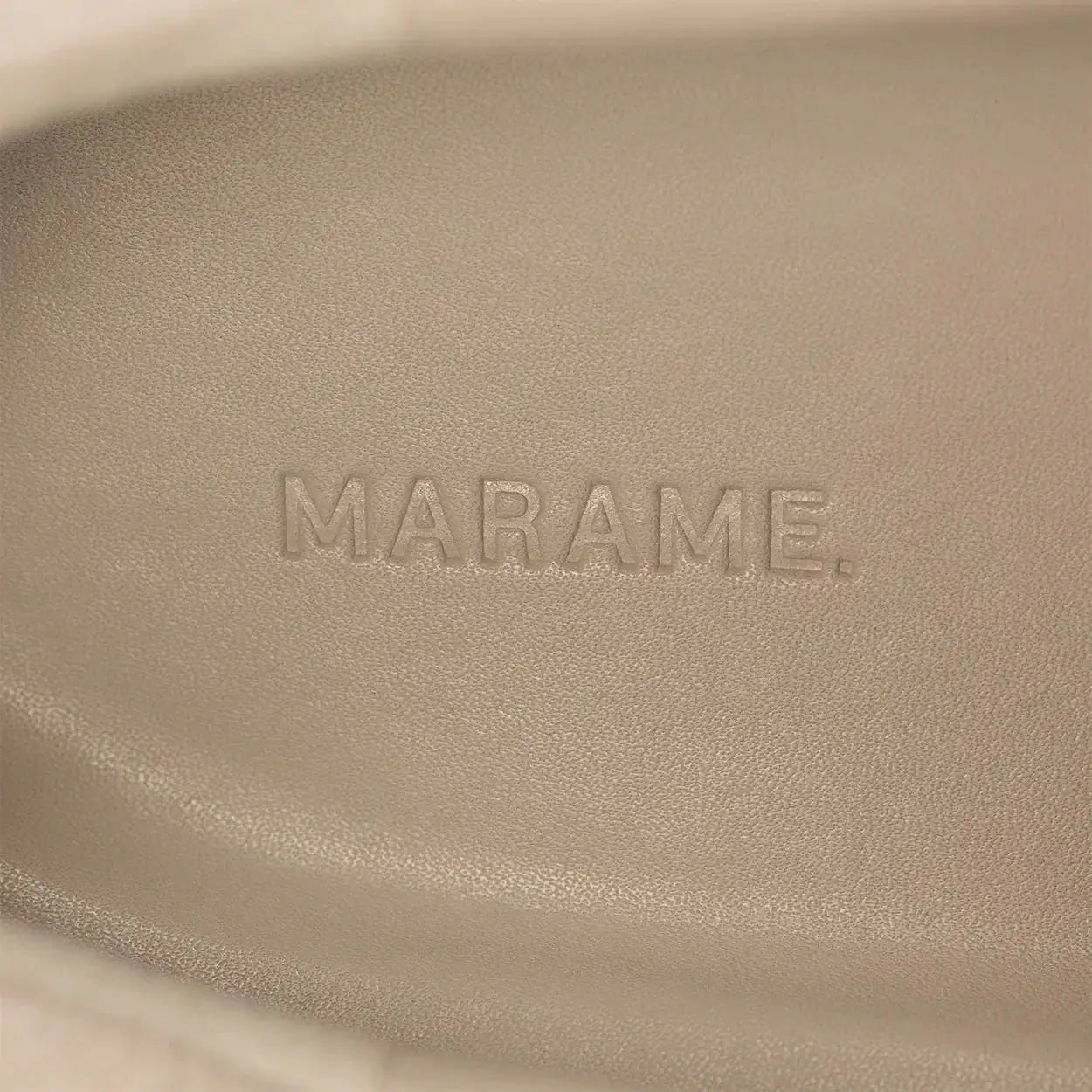Woman wearing Marame Smart Suede Trainers in Grey, detail.|grey