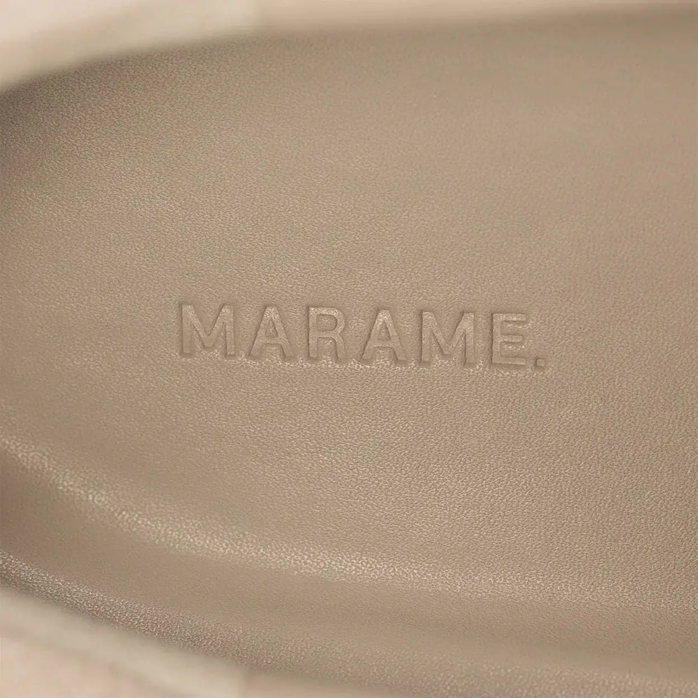 Woman wearing Marame Smart Suede Trainers in Grey, detail.|grey