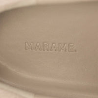 Woman wearing Marame Smart Suede Trainers in Grey, detail.