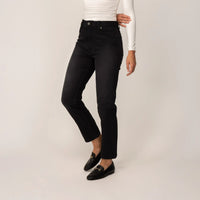 Woman wearing Marame Straight Leg Jeans in Black Wash Denim, front view.