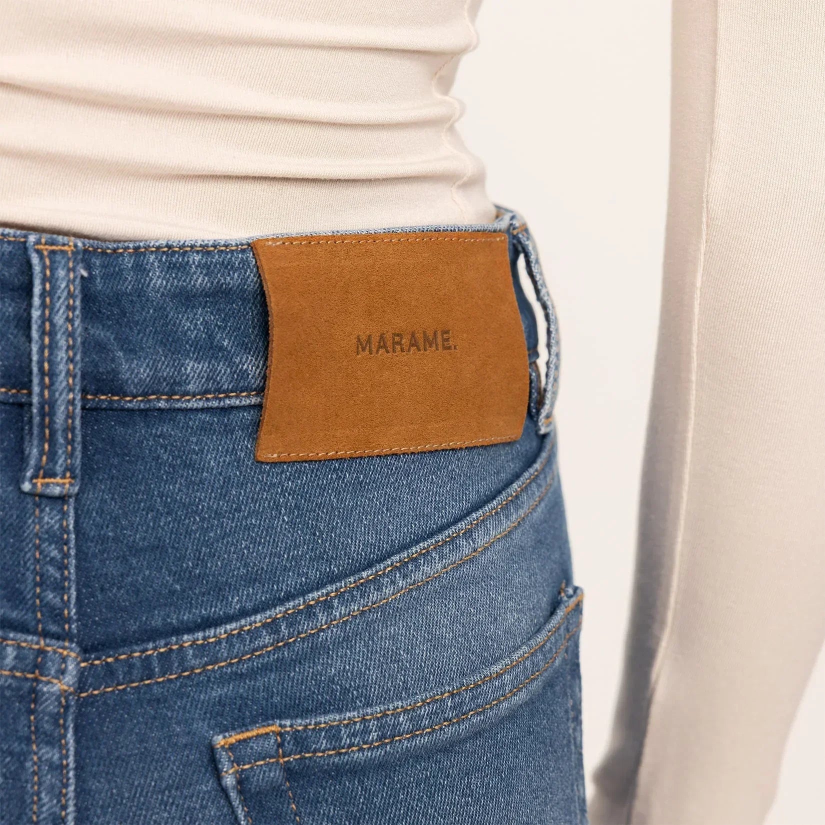 Woman wearing Straight Leg Jeans in Deep Navy Wash Denim, detail. |deep navy wash denim