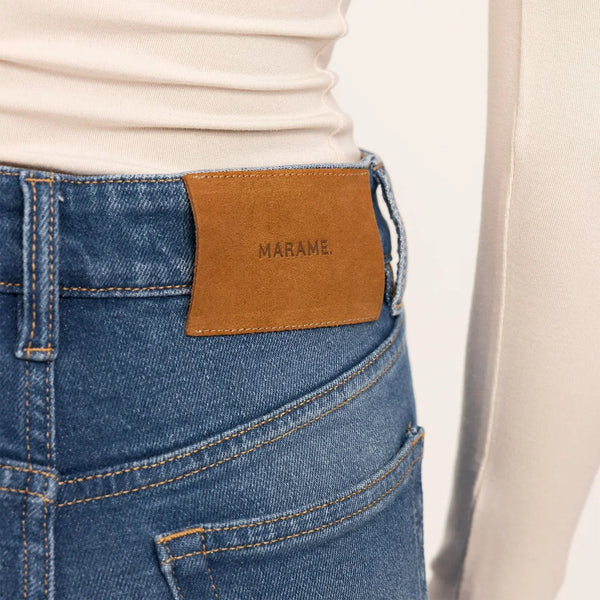 Woman wearing Straight Leg Jeans in Deep Navy Wash Denim, detail. |deep navy wash denim