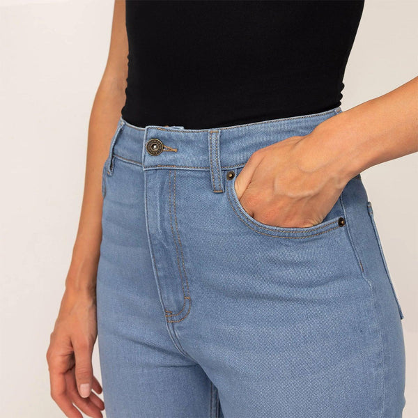 Woman wearing Straight Leg Jeans in Light Wash Denim, detail.
