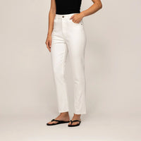 Woman wearing Marame Straight Leg Jeans in White Cotton Denim, front view. |white cotton denim