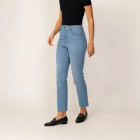 Woman wearing Marame Straight Leg Jeans in Light Wash Denim, front view. |light wash denim